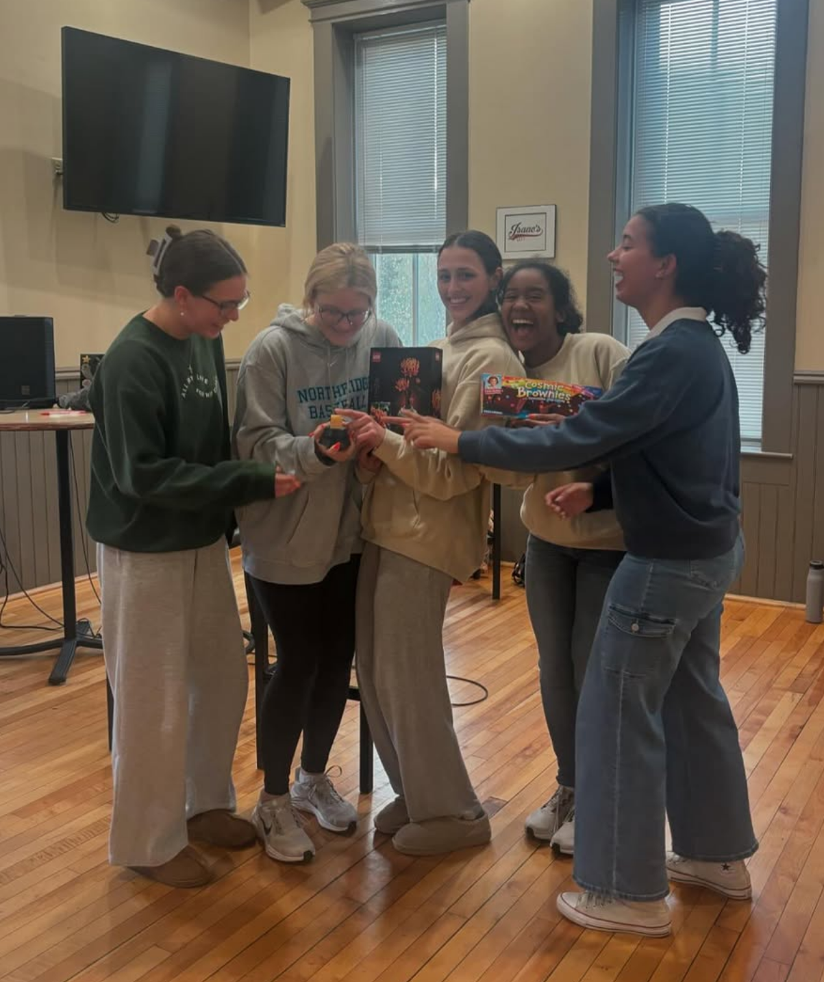 Volleyball team celebrating their round victory